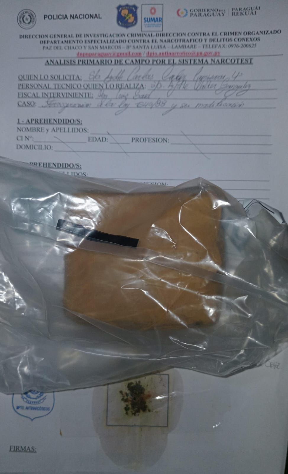 Ojetopa paquete de macoña en el patio de Tacumbú