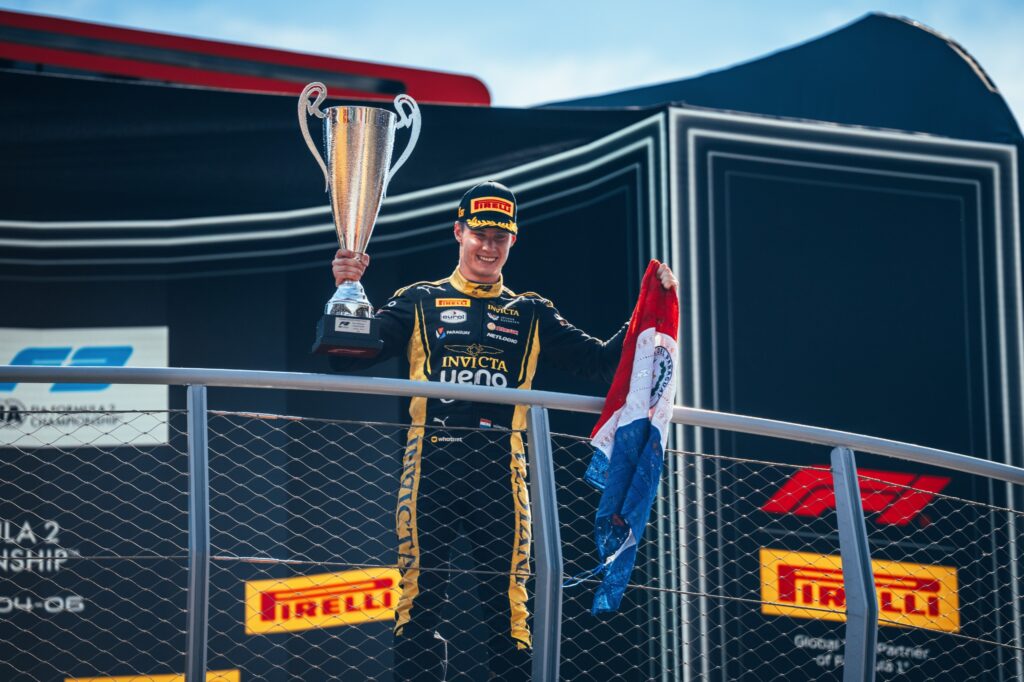 Triunfo purete de ñande piloto en Monza, Italia